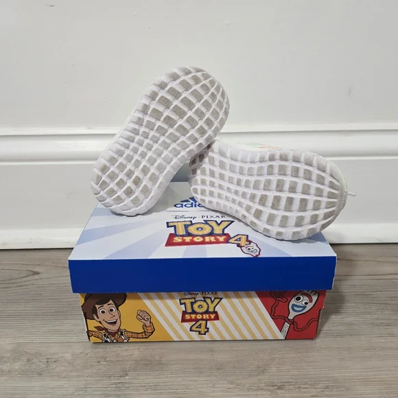 adidas gazelle silver green womens adidas Little Kids Originals x Toy Story Gazelle Casual Shoes in Orange/White/Gum main image 0